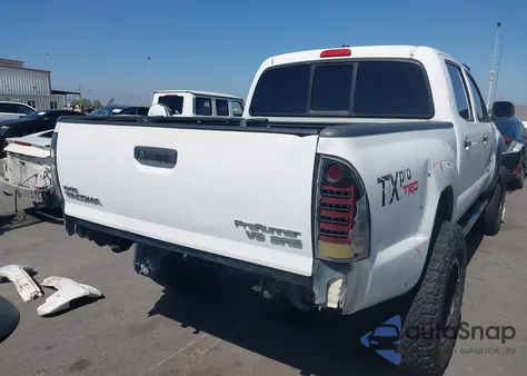 2011 Toyota Tacoma Base V6 z USA, uszkodzony, nr VIN 3TMLU4EN7BM074531